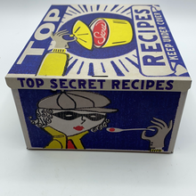 Load image into Gallery viewer, Blue Q Storage Tin Top Secret Recipes Mind blowing Information Inside
